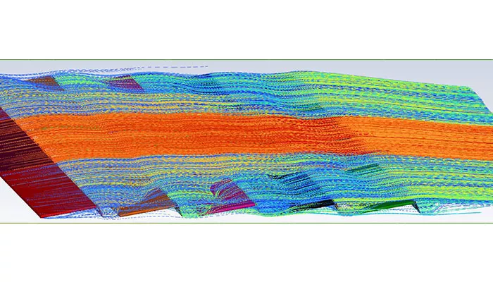 Visualización superior de líneas de corriente en simulación CFD del sistema fotovoltaico CSwind E-O con viento sur e inclinación de 10 grados, mostrando la dirección del flujo y zonas de turbulencia sobre los paneles solares.